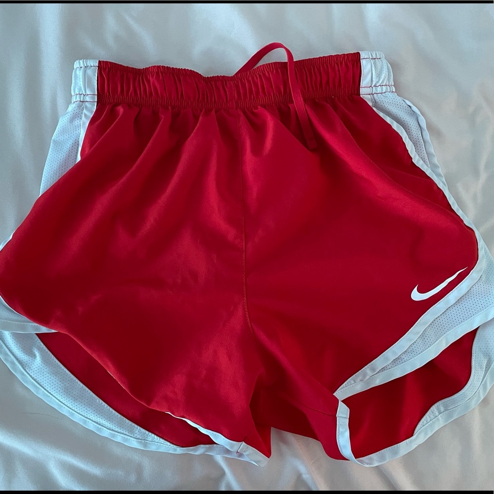 Red nike shorts, mesh still intact, size small